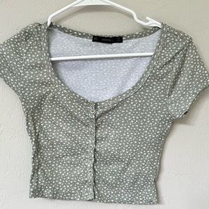 green and white floral baby tee